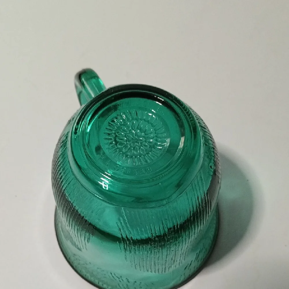 Green Glass Teacup and Saucer Set